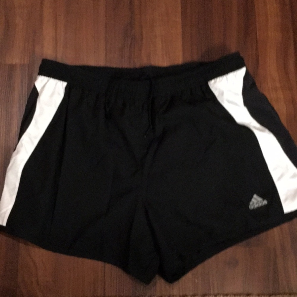 Black Women’s Adidas running shorts. Large